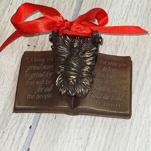 Vintage Metal/Brass Baby Jesus On The Bible Scripture Jesus Manger Sculpture